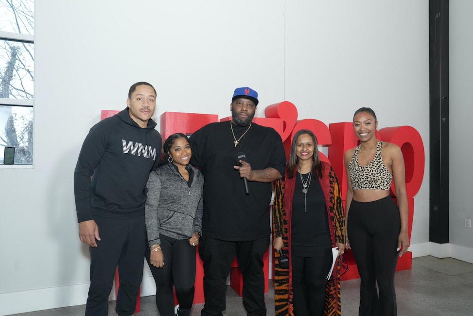 Rapper Killer Mike (center) poses with Robert Rushing, Toya Johnson-Rushing, Dr. Melissa Burroughs and yogi Lauren Williams during Live to the Beat event.
